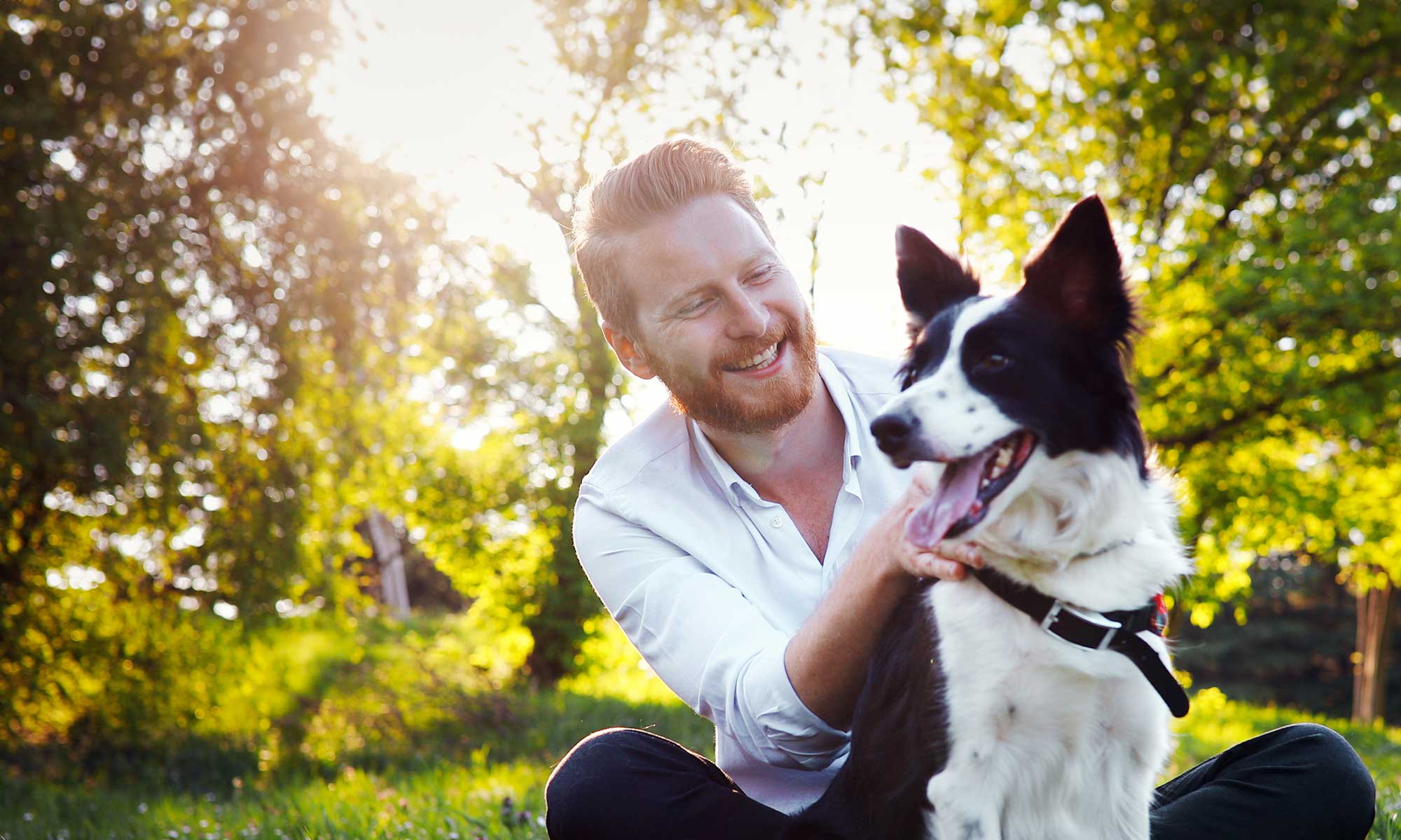 A man with a border collie